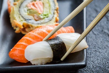 Sushi eaten with chopsticks