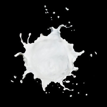 Round milk splash isolated on black