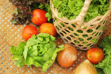 Vegetables salad and tomato in the basket