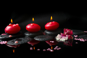 spa concept of white and red orchid (cambria), three  red candle