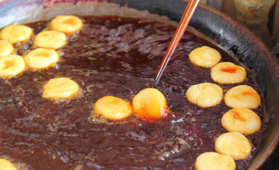 Deep-fried dough stick on the pan