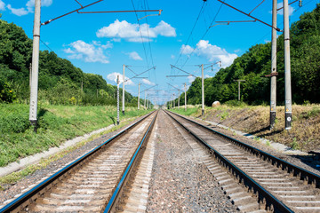 Fototapeta na wymiar Railway against the blue sky