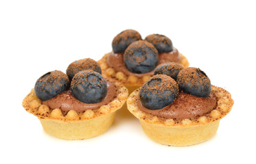 Tartlets with chocolate cream and blueberries