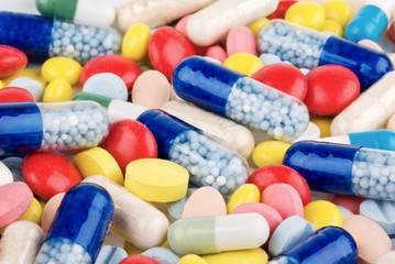 Color pills and capsules background