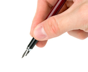 Hand holding a pen (writing or signing) isolated