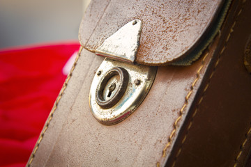 Old leather bag with rusty lock