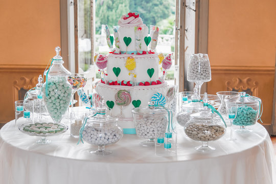 Dessert table with cake and candy for a wedding or party