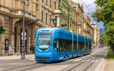 Modern tram on a street of Zagreb, Croatia - obrazy, fototapety, plakaty