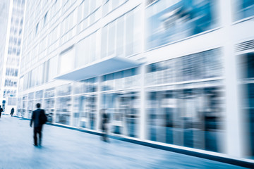 People walking in the business district,motion blur
