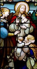 Obraz na płótnie Canvas Jesus Christ with children in stained glass