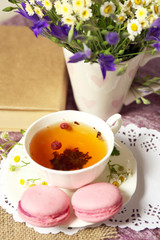 Obraz na płótnie Canvas Cup of fresh herbal tea on table