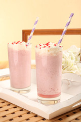 Delicious milkshake on table