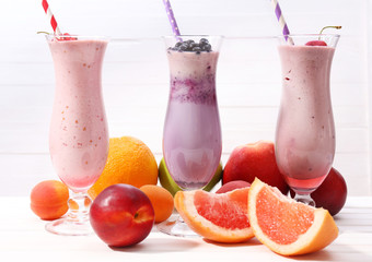 Delicious milkshakes on table, close-up