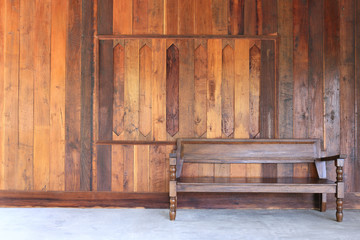 interior room with wood wall and wood bench