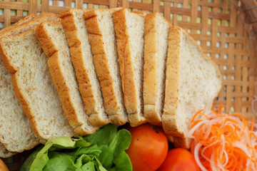 Fresh vegetables salad with whole wheat bread.