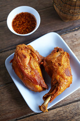 close up thai chicken fried on wooden table