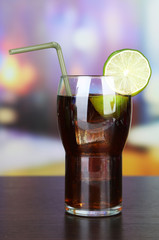 Tasty cocktail on bright background