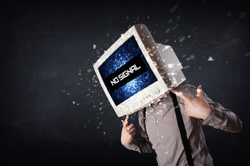 Man with a monitor head, no signal sign on the display