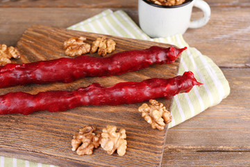 Tasty oriental sweets (churchkhela) and fresh nuts,