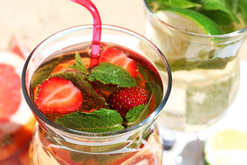 Delicious cocktails on beach, close-up