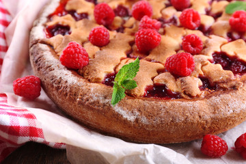 Tasty cake with berries on table close-up