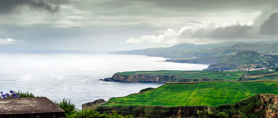 Azores Islands coastline in dramatic sky