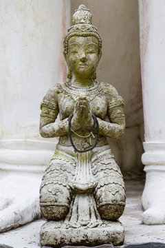 Front view of Thai angel statue in temple