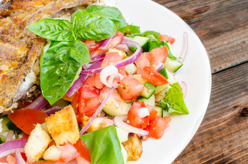 Chicken under a brick with panzanella salad