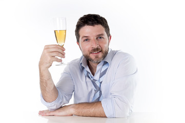 happy successful businessman celebrating with Champagne
