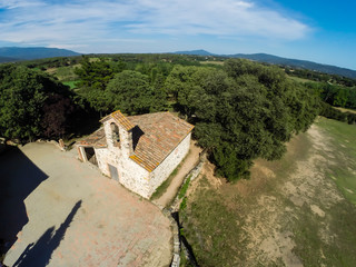 Fototapeta na wymiar aerial view of small rural church in Cardedeu, Catalonia