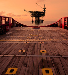 rig platform silhouette in oil and gas industry when sunset