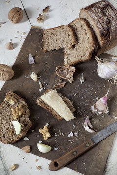 wholemeal bread with walnuts, parmesan cheese and garlic