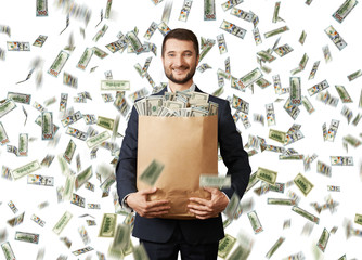 smiley businessman with money