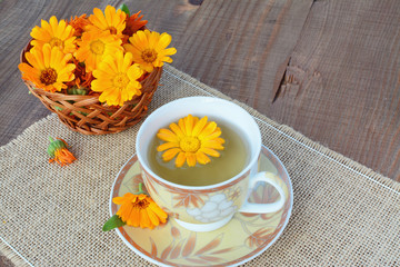 Herbal marigold tea with flowers