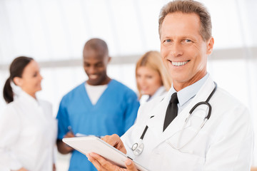 Fototapeta premium Feeling confident in his colleagues.