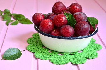 Plum in a white bowl.