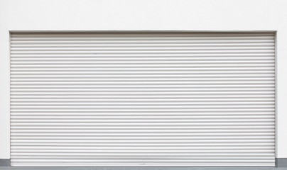 Fototapeta premium White metal shutters over a shop doors