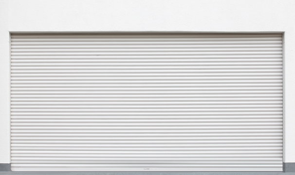 White metal shutters over a shop doors