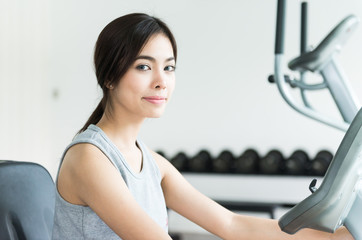 Fototapeta na wymiar Woman workout at fitness