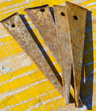 rusty and dirty iron wedges used on a construction site