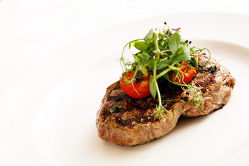 grilled steak with herbs
