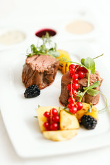 steak with fresh berries