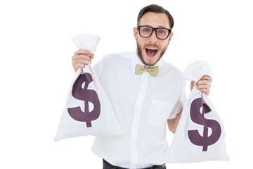 Geeky businessman holding money bags