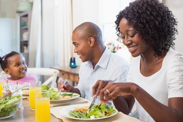 Happy family enjoying a healthy meal together
