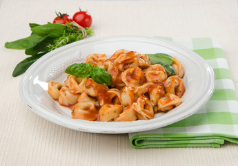 Italian tortellini pasta with tomato sauce