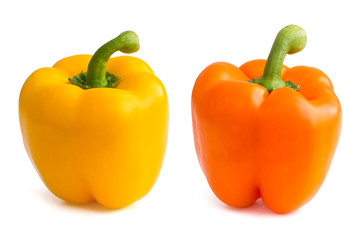 Orange and yellow bell peppers on white.