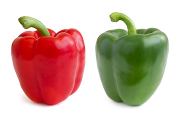 Red and green bell peppers on white.
