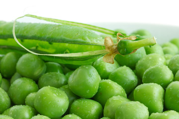 Detail of fresh garden peas. Whith empty shell.