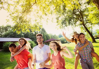 Friends having fun in park
