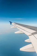 Fototapeta premium Airplane wing out of window